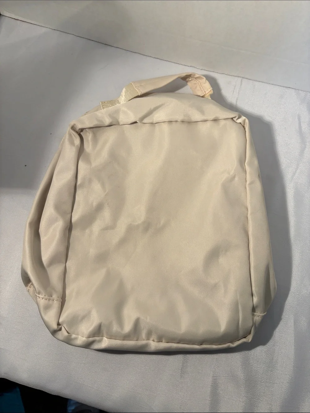Quilted Cream Cosmetic Bag with Brown Mesh Panel